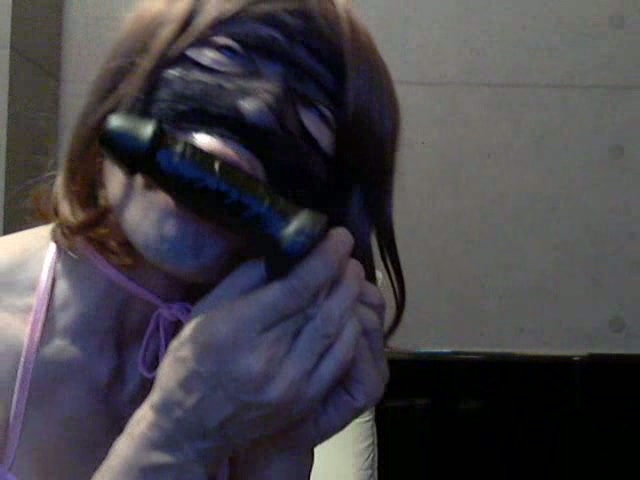 Randy masked CD playing with a toy & self sucking